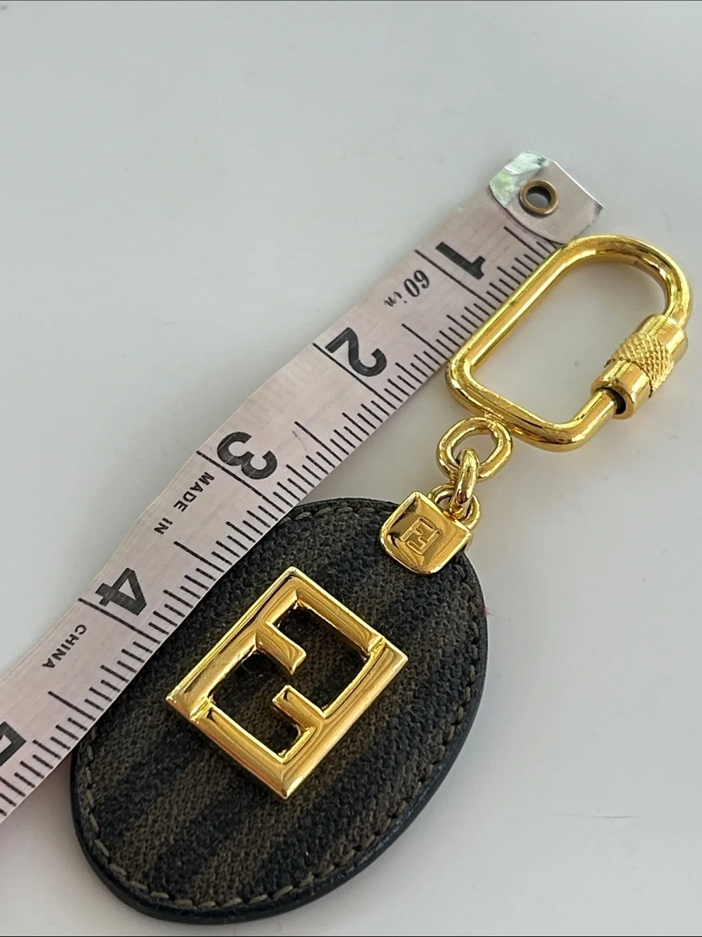 Authentic FENDI Vintage Zucca Monogram Oval Keychain / Bag Charm - Gold Hardware